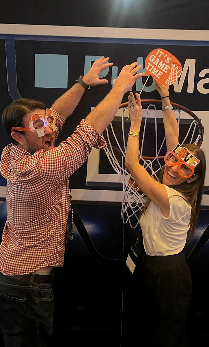 Dunking at the March Madness client happy hour.